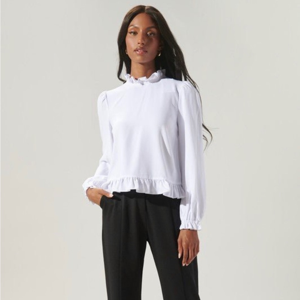 White ruffle blouse